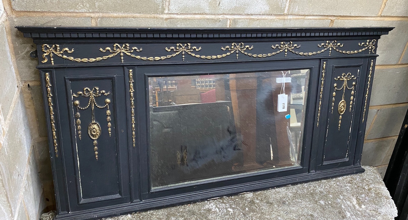 An Edwardian later painted overmantel mirror, width 138cm, height 68cm